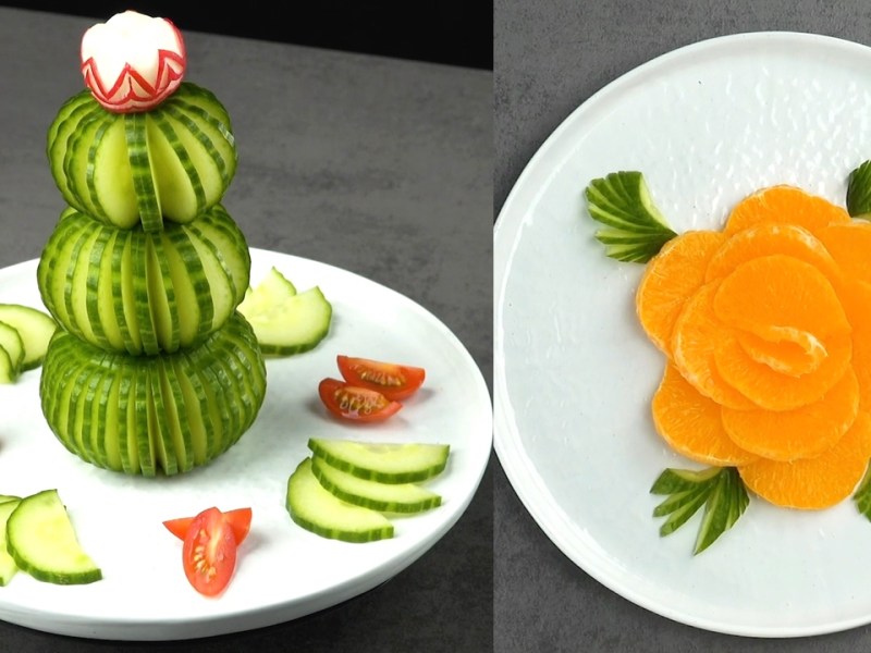 Snack-Ideen: eine Gurke dekoriert als Baum und eine Blume aus Mandarinenscheiben