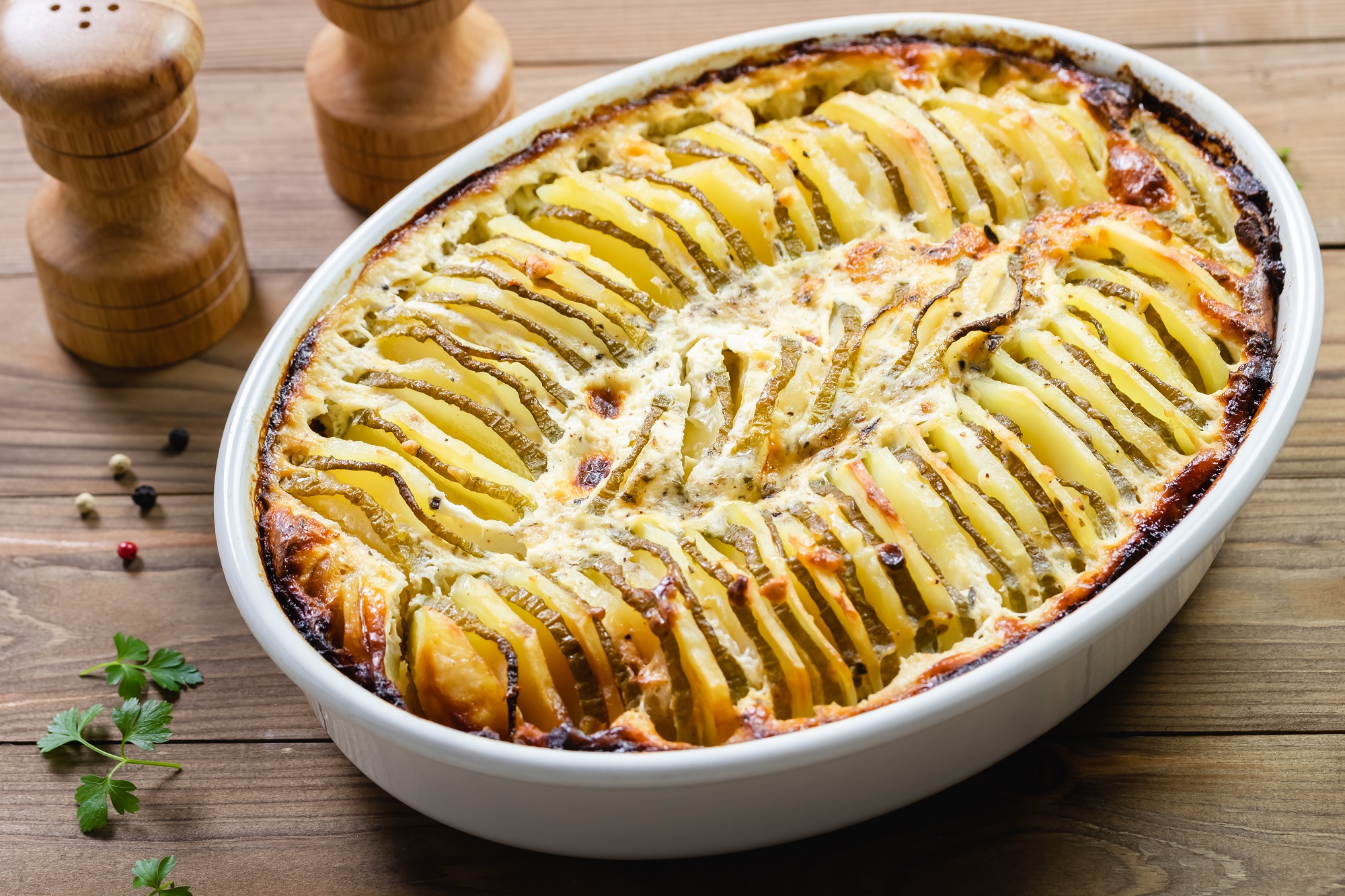 Kartoffel-Zucchini-Gratin: Auflauf für Veggie-Fans - Leckerschmecker